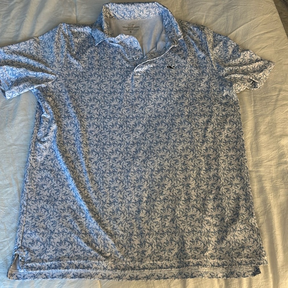 Vineyard Vines Sankaty Blue and White Fish performance polo.